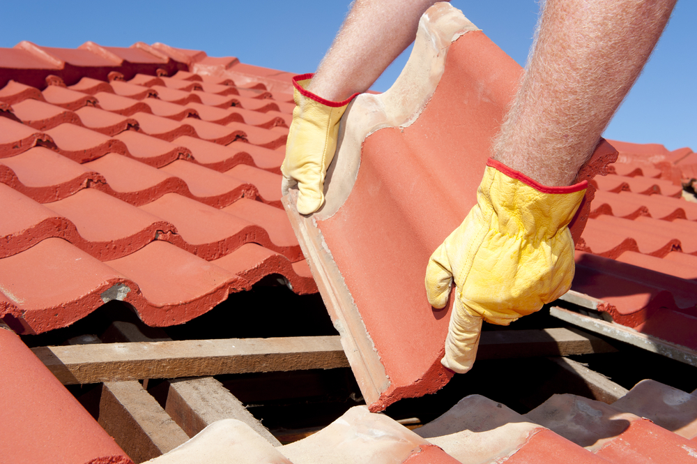 Roof repairs in progress on a Molendinar home