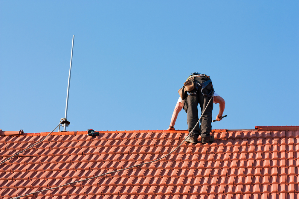 Roof repair work on a Ipswich tile roof