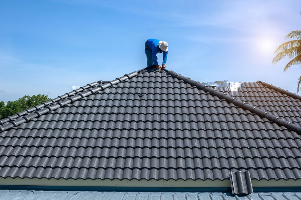 Flashed and bedded whirlybird base on a tile roof